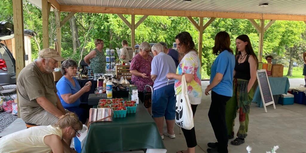 vendors and customers at hammond new york farmers market